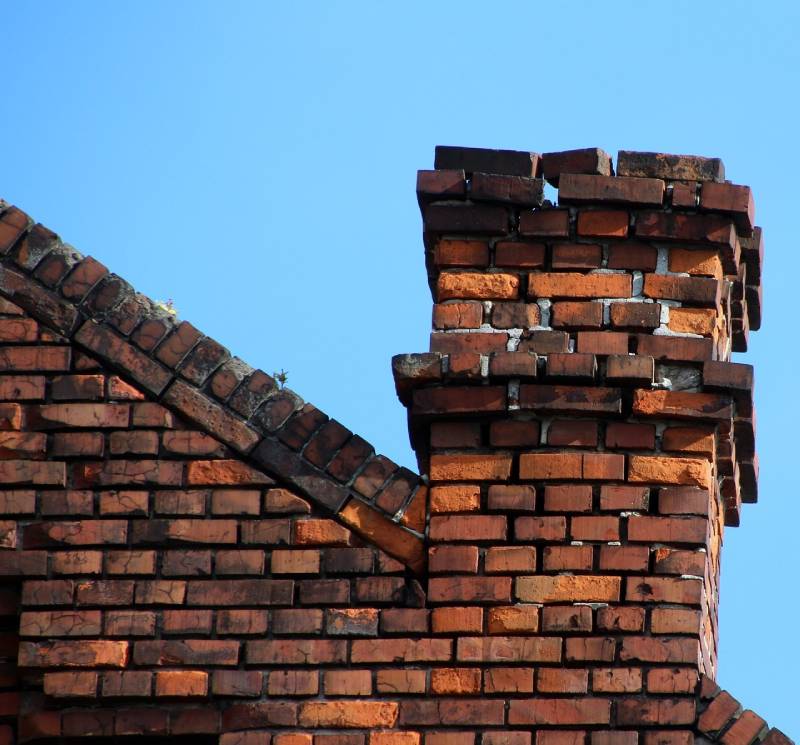 Signs Your Shorewood Home Needs a Chimney Inspection Damaged chimney on an Shorewood home showing cracks and missing mortar